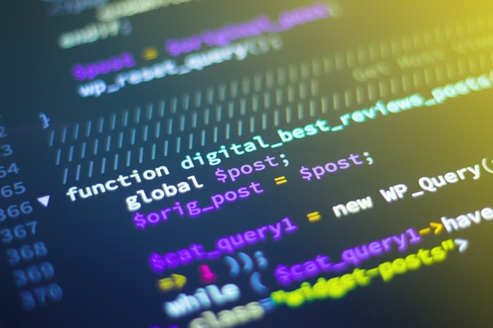 Developer workspace with code on screen for PowerShell orchestration
